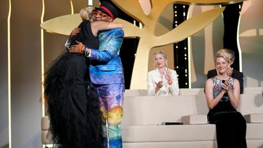 Julia Ducournau hugs jury president Spike Lee after winning the Palme d'Or 